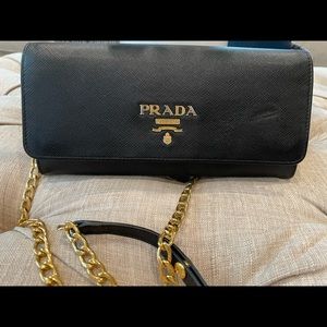 Authentic Prada, black WOC saffiano chain wallet .